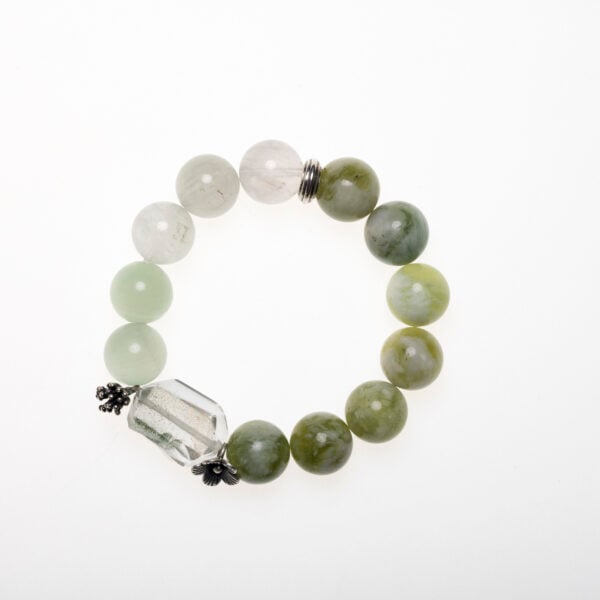 Green Crystal Bracelet – A beautiful bracelet made with green crystals, known for their healing properties, promoting balance, growth, and emotional healing.