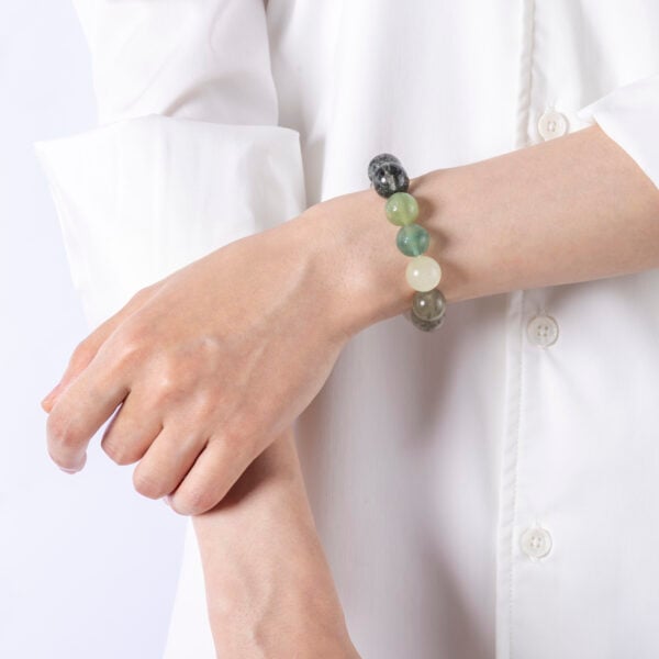 Green Crystal Bracelet – A beautiful bracelet made with green crystals, known for their healing properties, promoting balance, growth, and emotional healing.