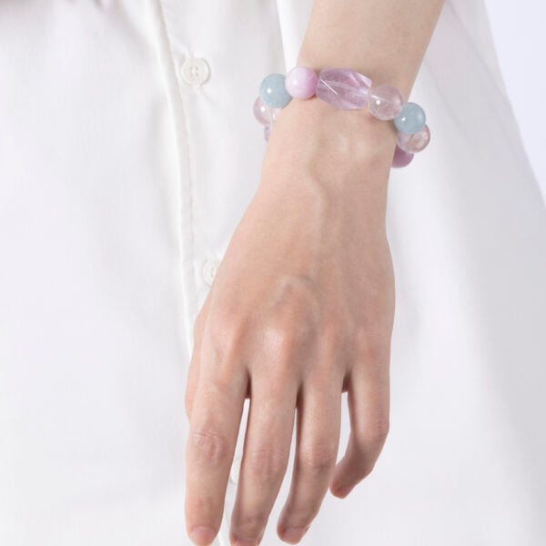 Healing crystal jewelry bracelet featuring Lepidolite, Aquamarine, Purple Rutilated Quartz, and faceted Lavender Amethyst for emotional clarity and inner peace