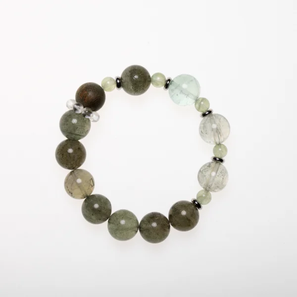Green Crystal Bracelet – A beautiful bracelet made with green crystals, known for their healing properties, promoting balance, growth, and emotional healing.