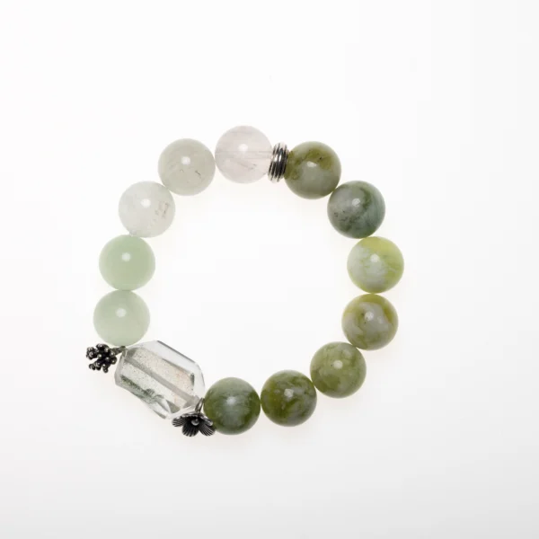 Green Crystal Bracelet – A beautiful bracelet made with green crystals, known for their healing properties, promoting balance, growth, and emotional healing.
