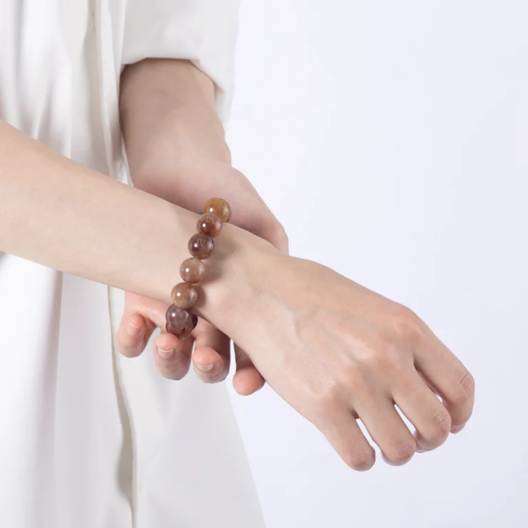 Red Rutilated Quartz Bracelet displayed on a neutral background