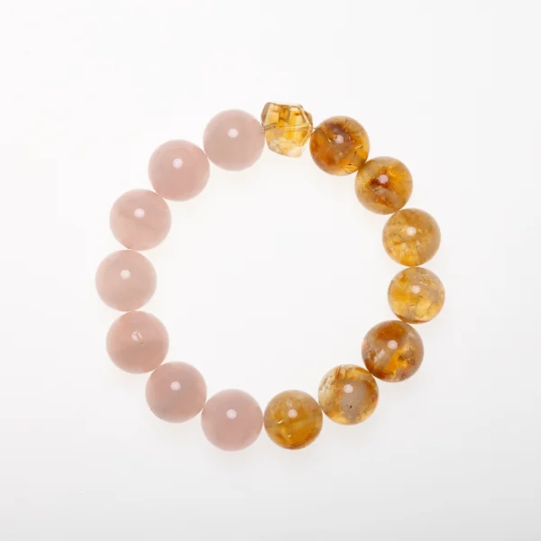 Rose Quartz Bracelet – A beautiful bracelet made with Rose Quartz crystals, known for their healing properties and ability to promote love, peace, and emotional healing.